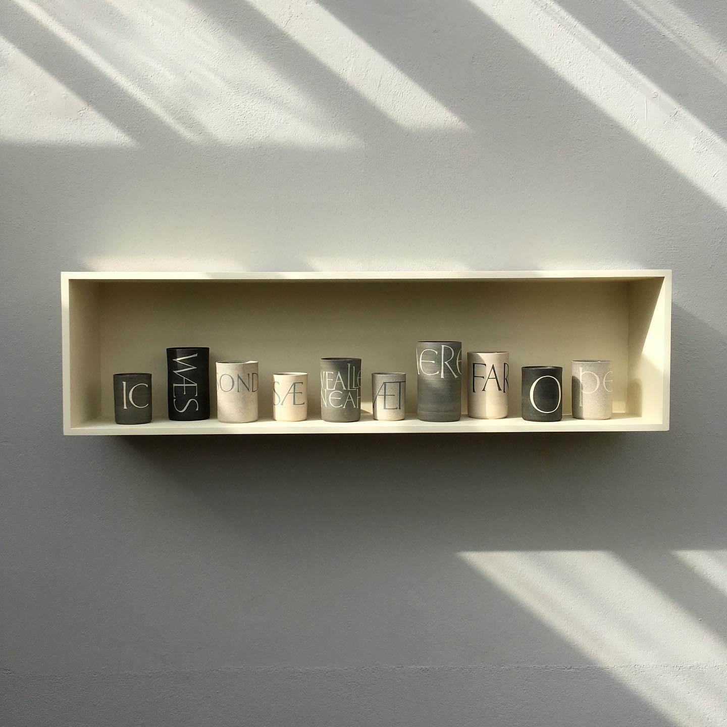 We made and installed this display box to house a collection of beautiful pots by Kate Scott Ceramics.